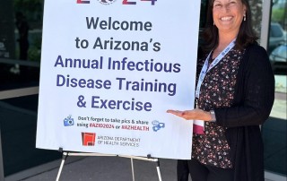 AZID 2024 Conference attendee with sign