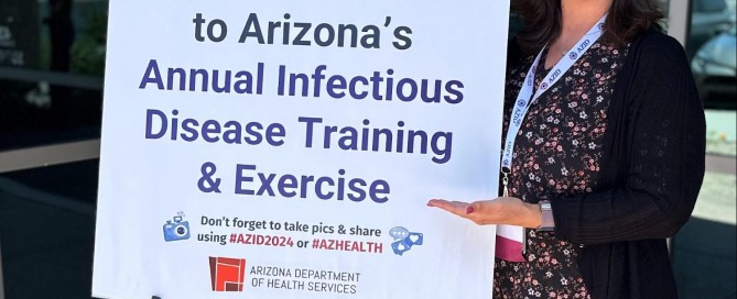 AZID 2024 Conference attendee with sign