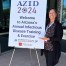 AZID 2024 Conference attendee with sign